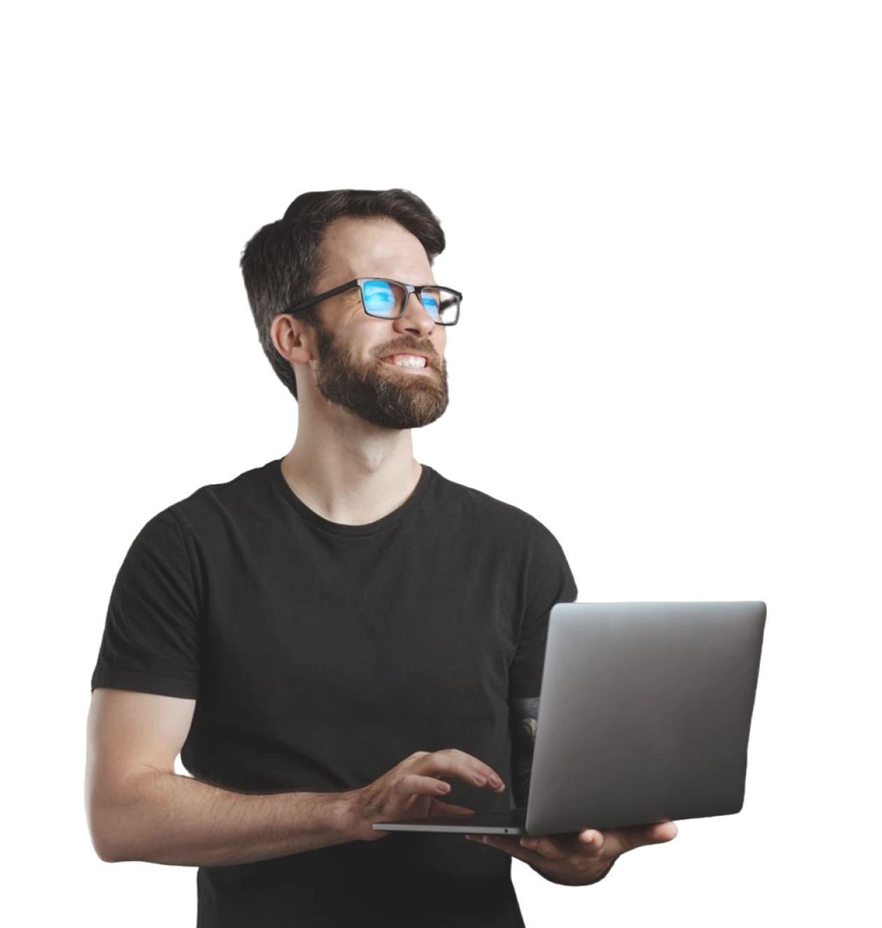 A creative professional with glasses looking up from a laptop, representing the innovative thinking at iTemi Media.